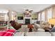 Warm and inviting living room with fireplace, built-in shelves, and comfortable seating at 634 Conover Rd, Durham, NC 27703