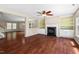 Spacious living area with hardwood floors, a fireplace, and an open layout at 634 Conover Rd, Durham, NC 27703