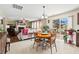 Open-concept kitchen and living area with hardwood floors, fireplace, and comfortable seating at 634 Conover Rd, Durham, NC 27703