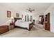Bright and airy main bedroom with en-suite bath, carpet flooring, and multiple windows for natural light at 634 Conover Rd, Durham, NC 27703