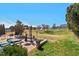 Brick patio with outdoor dining and lounge area provides a perfect space for relaxation and entertainment in the backyard at 634 Conover Rd, Durham, NC 27703
