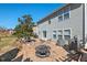 Spacious patio with outdoor dining and grilling area, perfect for entertaining or enjoying outdoor meals at 634 Conover Rd, Durham, NC 27703