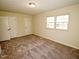 Bedroom features two large closets, carpet, natural light and fresh paint at 6525 New Market Way, Raleigh, NC 27615