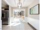 Bright dining area with a sliding glass door to the deck, neutral walls and view of the backyard at 7704 Cresthill Ct, Raleigh, NC 27615