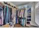 Well-organized walk-in closet with custom shelving and storage solutions at 8015 Papaya Dr, Raleigh, NC 27613