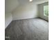 Well-lit bedroom with neutral carpet and a peaceful view at 81 Reece Dr, Sanford, NC 27332