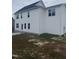 Exterior view of a two-story home with vinyl siding and a partially-sodded lawn at 81 Reece Dr, Sanford, NC 27332