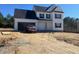 Charming two-story home with a two-car garage and a red truck in the driveway at 81 Reece Dr, Sanford, NC 27332