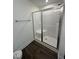 Modern bathroom featuring a glass-enclosed shower with built-in seating at 81 Reece Dr, Sanford, NC 27332