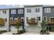 Attractive townhome exteriors feature individual balconies and attached garages at 819 Washington St, Fuquay Varina, NC 27526