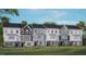 Charming townhome with a modern design and well-manicured lawn, showcasing curb appeal at 821 Washington St, Fuquay Varina, NC 27526