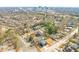 Aerial view of property showcasing its location within a neighborhood close to the city at 838 Woodburn Rd, Raleigh, NC 27605