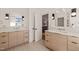 Dual modern vanities with sleek countertops and fixtures offering a functional and stylish design at 838 Woodburn Rd, Raleigh, NC 27605