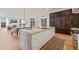 Spacious island with marble countertop and sink, perfect for entertaining and meal prep at 838 Woodburn Rd, Raleigh, NC 27605