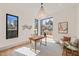 Bright home office with ample natural light, modern decor, and a cozy rug at 838 Woodburn Rd, Raleigh, NC 27605