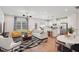 Inviting living room with a modern design, connecting seamlessly to the kitchen and dining area at 917 Montague Ave, Durham, NC 27703