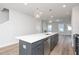 Modern kitchen with a spacious island, stainless steel appliances, and pendant lighting at 928 Allen Park Dr, Knightdale, NC 27604
