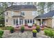 The backyard with spacious deck is perfect for entertaining or relaxing outdoors at 100 Burlingame Way, Cary, NC 27513
