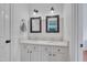 Bright bathroom features double sinks, white cabinets, and dark framed mirrors at 101 Overlake Dr, Chapel Hill, NC 27516