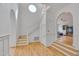 Grand foyer showcasing high ceilings, hardwood floors, and an elegant staircase at 101 Overlake Dr, Chapel Hill, NC 27516