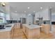 Large kitchen with white cabinets, stainless steel appliances and quartz countertops at 101 Overlake Dr, Chapel Hill, NC 27516