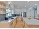 Spacious kitchen featuring white cabinets, stainless steel appliances, and a center island at 101 Overlake Dr, Chapel Hill, NC 27516