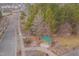 Aerial view of community park featuring gazebo, walking paths, benches, and mature trees at 101 Overlake Dr, Chapel Hill, NC 27516