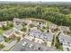 A high aerial view of a neighborhood of homes surrounded by mature trees at 1012 Palace Garden Way, Raleigh, NC 27603