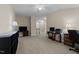 Open bedroom featuring neutral carpet and multiple work stations at 1012 Palace Garden Way, Raleigh, NC 27603