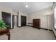 Neutral bedroom with dark wood trim, a ceiling light, and carpeted flooring at 1012 Palace Garden Way, Raleigh, NC 27603