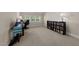 Bedroom featuring neutral carpet and two windows at 1012 Palace Garden Way, Raleigh, NC 27603