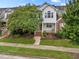 Well-manicured lawn accentuates this attractive two-story home with a covered front porch at 1012 Palace Garden Way, Raleigh, NC 27603