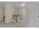 Hallway offering neutral carpet and white trim at 1012 Palace Garden Way, Raleigh, NC 27603