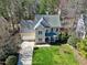 Aerial shot of a two-story house and a spacious green lawn at 104 Musgrove Cir, Cary, NC 27518