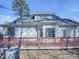 Rear of a house featuring a large deck and bay window with beautiful architectural design at 104 Walnut Creek Dr, Clayton, NC 27520