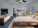This bright main bedroom is virtually staged, with walk-in closet and bath access at 104 Walnut Creek Dr, Clayton, NC 27520