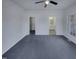 A spacious main bedroom with a large window, and access to the walk-in closet and bath at 104 Walnut Creek Dr, Clayton, NC 27520