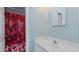 Bathroom featuring a vanity, mirror, and a bathtub with a pink floral shower curtain at 1253 Skyview Dr, Mebane, NC 27302