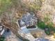 Bird's-eye view showcases the home's roofline, expansive driveway, and well-maintained yard at 126 Maltland Dr, Cary, NC 27518