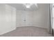 Spacious bedroom with neutral walls, carpet, closet and ceiling fan providing comfort and style at 126 Maltland Dr, Cary, NC 27518