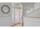 Inviting foyer with hardwood floors and a staircase leading to the upper level at 126 Maltland Dr, Cary, NC 27518