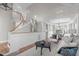 Open-concept living room with hardwood floors flowing into dining area at 126 Maltland Dr, Cary, NC 27518