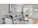 Bright living room featuring a large window and neutral decor at 126 Maltland Dr, Cary, NC 27518