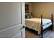 Cozy bedroom featuring a comfortable bed, soft lighting, and charming decorative art at 133 Sandcastle Ln, Four Oaks, NC 27524