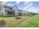 The backyard is fenced and landscaped, with a screened porch at 183 Post Oak Rd, Chapel Hill, NC 27516