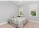 Bright bedroom with neutral colors, natural light, and a serene atmosphere at 183 Post Oak Rd, Chapel Hill, NC 27516