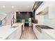 Well-equipped kitchen with stainless appliances, a large island, and ample cabinet space at 183 Post Oak Rd, Chapel Hill, NC 27516