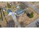 Aerial view of the property showcasing the house, yard, and surroundings at 20 Jenmar Dr, Fuquay Varina, NC 27526