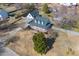 Aerial view of home with lush greenery and a long driveway at 20 Jenmar Dr, Fuquay Varina, NC 27526