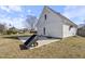Spacious backyard featuring a concrete patio, great for outdoor activities and relaxation at 20 Jenmar Dr, Fuquay Varina, NC 27526